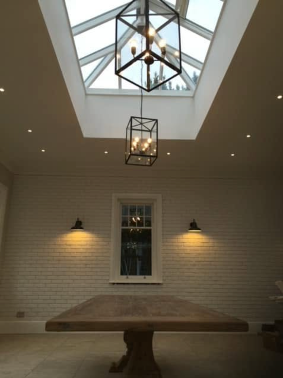 Screenshot 2026-10-07 at 16.26.28 Pendant lights and recessed ceiling lighting beneath a roof lantern