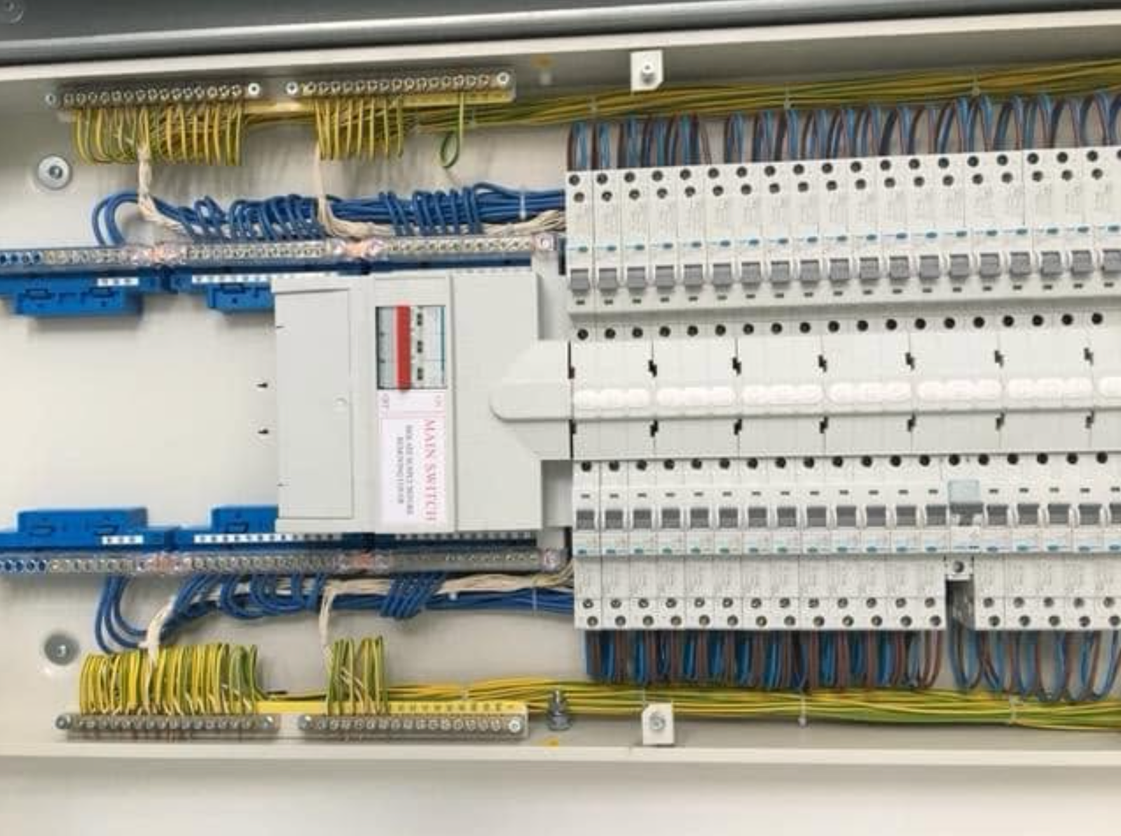 Screenshot 2026-10-07 at 16.27.22 Electrical distribution board with organised wiring and circuit breakers